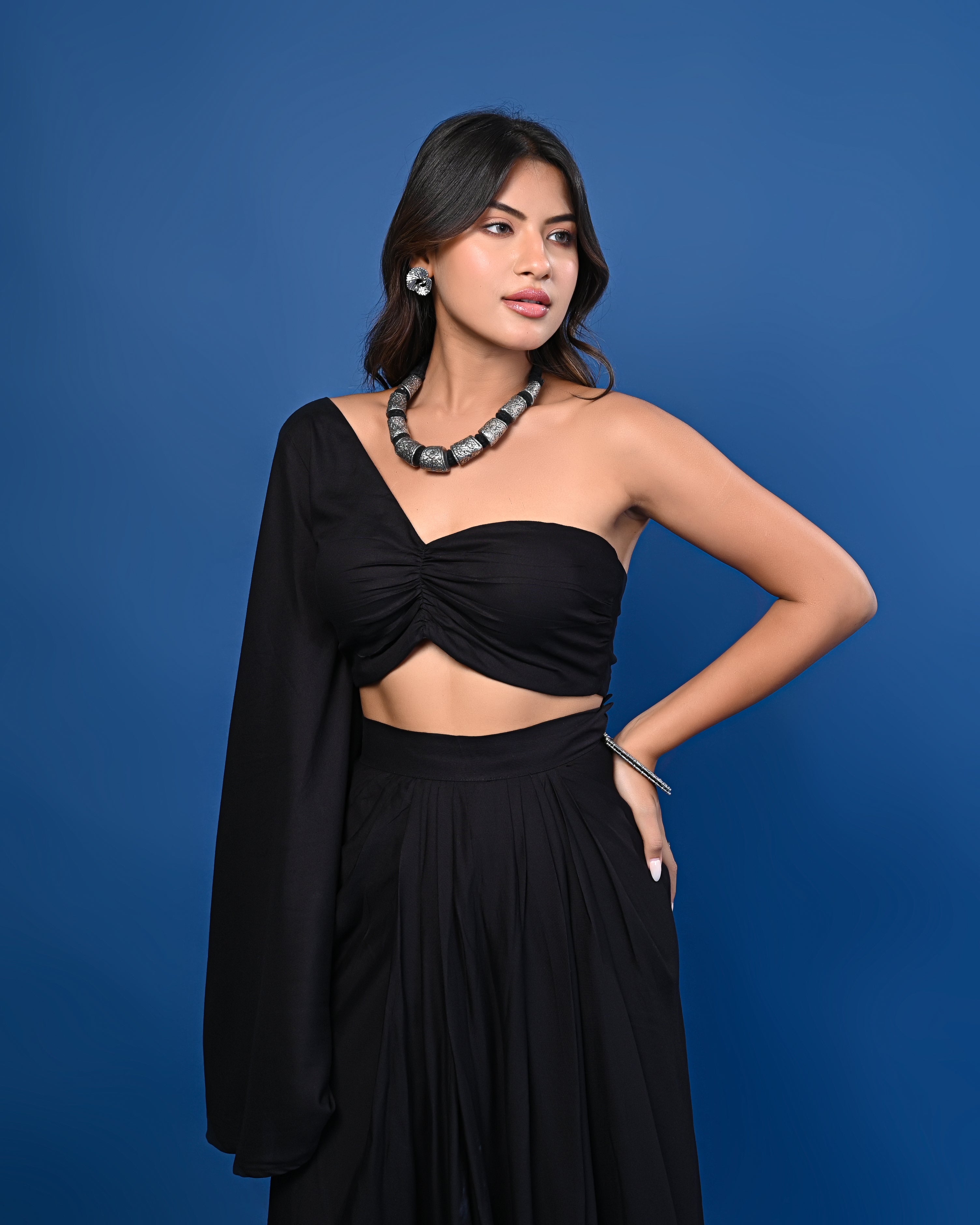 Black One-Shoulder Crop Top with Pleated Black Skirt
